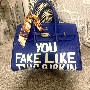 Beautiful royal blue handbag.